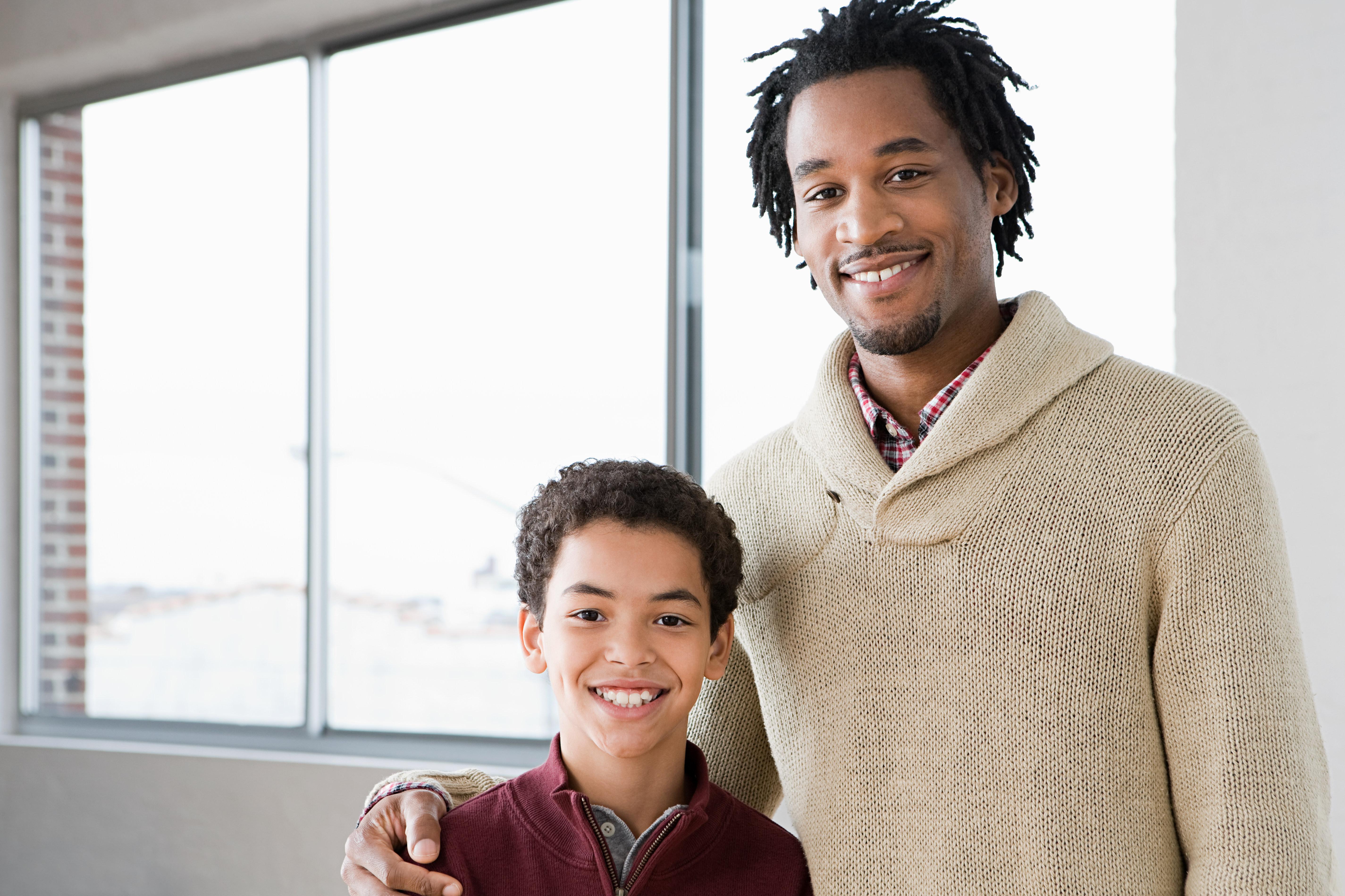 Man mentoring boy