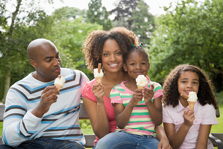 Family in park with ice creams