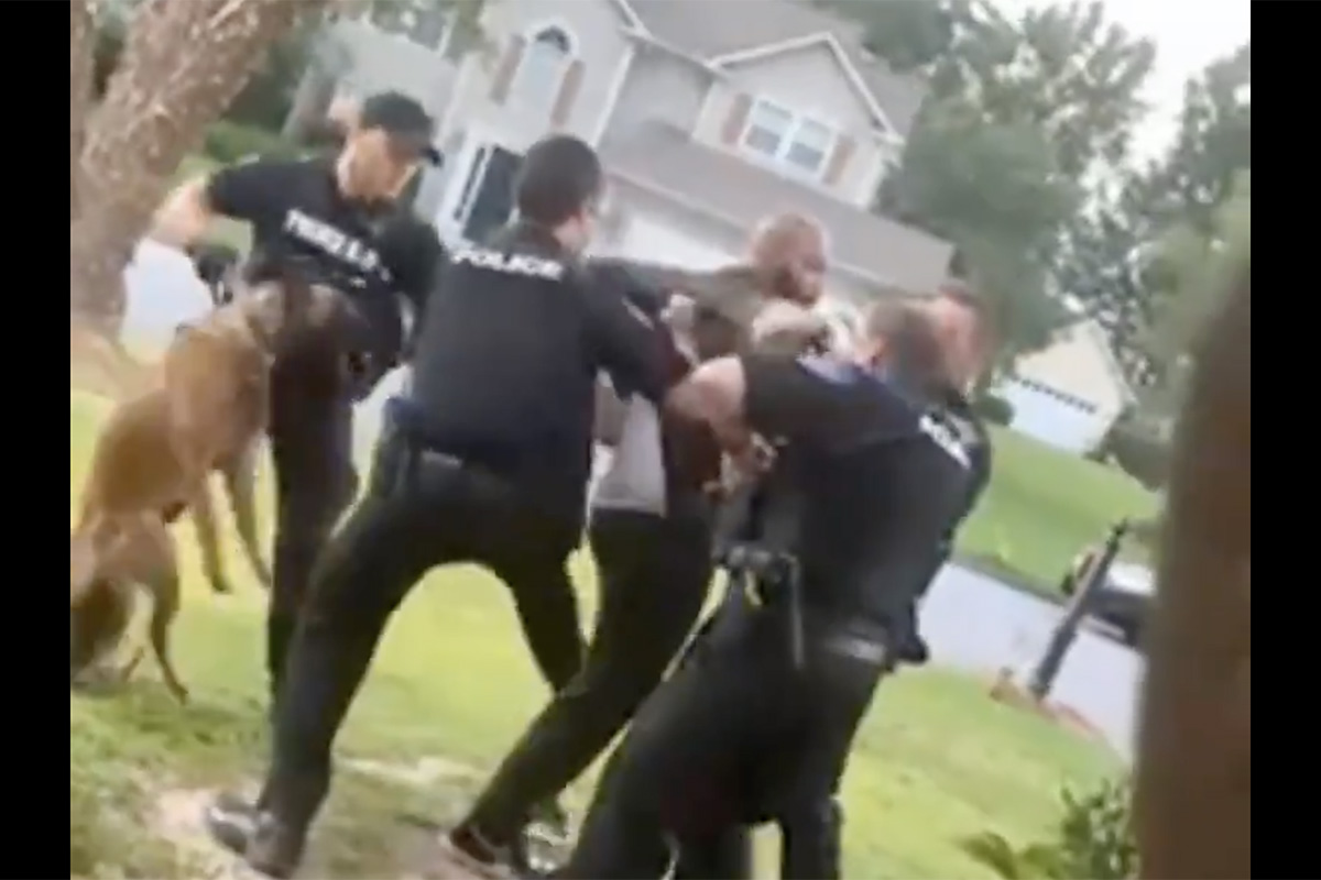 Travis Moya being attacked by Alpharetta PD K-9